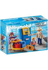 Playmobil Famille de vacanciers et Borne d'Enregistrement